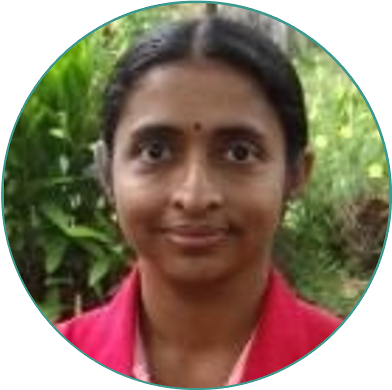 Rohini Krishnamurthy, Director of Product & Manufacturing in professional red top with outdoor background